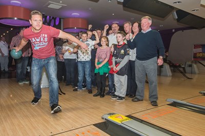Crusaders players ad supporters were at Tenpin at Eagles Meadow, Wrexham to raise cash for the supporters trust. Player Christiaan Roets is roared on by Supporters Trust members and family.