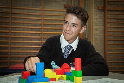 ANWYL BUILDING COMPETITION AT HAWARDEN HIGH SCHOOL. pICTURED IS project Manager Lewis Jones.