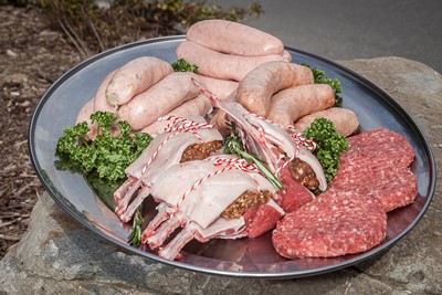 Bodnant Welsh Food wins  gold and silver medals at the  Welsh Excellence in Meat Awards. Pictured is Bodnant Butcher Jason Frasor with some of the winning produce.